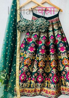 Green banarasi silk ready to wear indian wedding party wear designer lehenga choli for women or girls. 👉 Product Specification Lehenga(Semi-Stitched) Lehenga Fabric : Banarasi silk Lehenga Work: Zari Weaving Work Waist: Support Up To 42 Stitching: Stitched With Canvas Lehenga Closer: Drawstring Length : Up to 42+ Flair: 3+ mtr (adjust according to your waist fitting). Blouse : Blouse Fabric : Silk Blouse Work: Embroidery work Blouse Size: Up to 44. Dupatta: Dupatta fabric : Net Work : Lace border Our products are 100% authentic and genuine. We guarantee your satisfaction! Indian Vastraa was started with the goal of offering the best in Indian ethnic fashion at unbeatable prices. Visit our Store and Show all Latest Collection: https://www.etsy.com/shop/indianvastraa If you have any Query r Floor-length Brocade Choli With Dupatta, Navratri Reception Choli With Self Design, Reception Choli With Self Design For Navratri, Fitted Banarasi Silk Sets With Meenakari Details, Fitted Banarasi Silk Sets With Meenakari, Unstitched Brocade Lehenga For Reception, Anarkali Brocade Choli For Reception, Banarasi Silk Choli For Eid Reception, Semi-stitched Art Silk Lehenga With Self Design