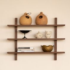 Floating Shelving Unit | Clever Shelf Diy Mid Century Shelves, Creative Shelf Design, Midcentury Modern Floating Shelf, Wood Shelving, Staggered Floating Shelves, Walnut Wall Shelves, Mid Centry Modern Shelves, Mid Century Shelving, Bookcase Inspiration