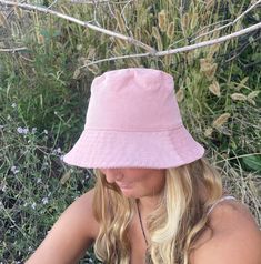 The perfect bucket sun hat for sunny days! Hand made in the USA from 100% cotton blush pink corduroy makes this hat very comfortable to wear. I made this hat with a day of fun in the sun in mind! This hat is made from a blush pink 100% cotton corduroy fabric. Inside liner is white cotton. Brim measures approx. 2.5" wide. Crown measures approx. 3.5" deep. For baby and child sizes see link below Available in sizes: Adult Small - 21" to 22" head circumference Adult Medium - 21.5" to 22.5" head circ Cotton Bucket Sun Hat For Summer, Summer Cotton Bucket Sun Hat, Adjustable Pink Sun Hat For Day Out, Casual Pink Hats For Day Out, Cotton Bucket Sun Hat For The Beach, Cotton Bucket Hat For Beach, Summer Cotton Hat For Day Out, Pink Cotton Summer Hat, Pink Summer Cotton Hat