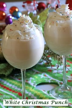 two wine glasses filled with white christmas punch