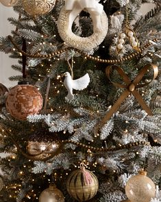 a decorated christmas tree with ornaments on it