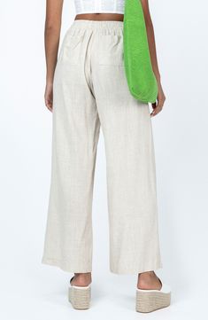 Look forward to the sunnier seasons even more in these breathable cotton and linen pants boasting a comfy drawstring waist. Elastic/drawstring waist Back patch pockets 55% cotton, 45% linen Machine wash, line dry Imported Comfortable Cotton Bottoms For Vacation, Cotton Loungewear Pants With Tie Waist, Cotton Lounge Pants With Tie Waist, Cotton Pants With Tie Waist For Loungewear, Spring Linen Leisure Bottoms, Summer Beige Cotton Wide Leg Pants, Beige Cotton Wide Leg Summer Pants, Beige Cotton Wide Leg Pants For Summer, Summer Linen Drawstring Pants