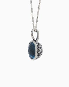 The Square Stone Pendant features a faceted London blue topaz stone set in sterling silver with a unique petroglyph texture. Take notice of the twisted detailing on the bail which adds a playful touch. Pair with your favorite chain, sold separately. Metal: Sterling silver Stone: London blue topaz Dimensions: 23mm x 14mm Stone Size: 12mm x 12mm Style #: P246Lb Fine Jewelry: Sterling Silver Sapphire Jewelry, Fine Jewelry Sapphire Sterling Silver, Sterling Silver Jewelry With Diamond Cut Round Stone, Sapphire Sterling Silver Fine Jewelry, Blue Topaz Briolette Jewelry Gift, Fine Jewelry Sapphire In Sterling Silver, Luxury Sapphire Oval Pendant Jewelry, Blue Topaz Briolette Jewelry For Gifts, Luxury Sterling Silver Oval Pendant Jewelry