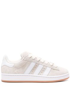 Find ADIDAS Campus 00s Suede Sneakers on Editorialist. wonder white/cloud white calf suede padded design logo-debossed tongue signature 3-Stripes logo branded heel counter front lace-up fastening round toe branded insole flat rubber sole Womans Addidas Shoes, Shoes To Wear For School, Winter Shoes Teen, Cute Shoes For Everyday, Cute Trendy Shoes For Teens, Everyday White Shoes, Everyday Casual Shoes, Cute Cheap Sneakers, Cream Adidas Campus