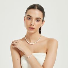 Immerse yourself in timeless grace with our white freshwater pearls strand, featuring a gradual size transition. Each pearl elegantly increases in size, creating a fluid and cascading effect. Perfect for those who appreciate refined sophistication. Add a touch of elegance to any ensemble. Product Information Pearl Type Freshwater Pearl Origin China Shape Round Quality AAAA Size 4-10mm Nacre Thick Color White Luster Very High Elegant Pearl Bracelet For Formal Occasions, Timeless White Pearl Drop Bracelet, Elegant Pearl Drop Bracelet, Timeless White Pearl Bracelet, Elegant White Pearl Bracelet, Elegant Single Strand Pearl Bracelet For Wedding, Elegant White Pearl Chain Bracelet, Elegant White Pearl Bracelet For Formal Occasions, Elegant White Pearl Bracelet For Formal Events