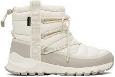 Ankle-high quilted ThermoBall™ Eco-insulated recycled PET ripstop boots in white. Water-repellent non-PFC DWR coating. · Waterproof DryVent™ membrane · Lace-up closure · Logo-woven webbing trim at sides · Bungee-style drawstring at collar · Pull-loop at heel counter · Cushioned OrthoLite® Eco LT™ footbed · Faux-fur lining · EVA foam rubber midsole · Treaded rubber outsole Supplier color: Gardenia white/Silver grey North Face Boots, North Face Outfits, Eva Foam, Wedge Sneaker, White Silver, Luxury Streetwear, Lace Up Boots, Cute Shoes, Water Repellent