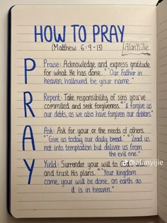 an open notebook with the words how to pray written on it