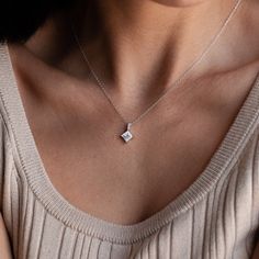 DESCRIPTION ✦ Radiant Elegance: Experience the enchantment of this necklace, featuring a stunning 2.50 carat Princess cut Moissanite that exudes timeless charm. ✦ Stone Showcase:Shape: Princess Cut MoissaniteWeight Range: 2.50 CTColor: DEF (Colorless)Clarity: VVS ✦ Crafted to Perfection:Metal Choices: Crafted in Gold (14KT, 18KT)Tonal Variety: Choose from Yellow, White, or Rose Gold✦ Chain Length Options16inches+2inches extender ✦ Embody sophistication with this exquisitely crafted pendant, merging classic allure with modern elegance. Beyond a mere accessory, this necklace embodies your impeccable style and enduring grace.