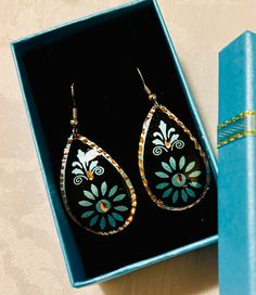 Elegant, handcrafted, cooper engraved Turkish earrings.  These Turkish handmade earrings are a perfect gift for someone special. Crafted from high-quality copper, they feature an intricate engraving that adds a touch of beauty to any outfit. The earrings are perfect for those who appreciate unique and exquisite jewelry pieces. The earrings are designed with a focus on beauty and elegance, making them a great addition to any jewelry collection. The engraved design adds a touch of sophistication to the overall look, making them perfect for both casual and formal occasions. These earrings are sure to impress and make a great statement piece. Unique Hand Painted Copper Jewelry, Unique Hand-painted Copper Jewelry, Unique Hand Painted Earrings For Gift, Teardrop Copper Jewelry Gift, Teardrop Copper Jewelry For Gifts, Handmade Artistic Copper Earrings, Copper Teardrop Jewelry For Gift, Copper Teardrop Jewelry Gift, Engraved Teardrop Earrings For Gift