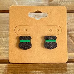 These are our new, Thin Green Line Badge Earrings! Since we have been getting a ton of requests for Military Remembrance/ Conservation Officer earrings, we thought we would make a pair of thin green line badge earrings that are universal, no matter where you live ☺️ Here are the details: -You are purchasing ONE pair of our Thin Green Line Glitter Badge Earrings. -Design features an acrylic badge with a green metallic line representing military as well as conservation officers such as game warden Conservation Officer, Game Warden, Remembrance Jewelry, Earrings Design, Earring Posts, Jewelry Earrings Studs, Post Earrings, Design Features, Happy Shopping