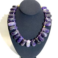 The necklace is made of irregularly shaped semi-precious Amethyst stone, showcasing the different shapes of purple called “Rose de France." The meaning of Amethyst has long been synonymous with spirituality and is famed for its close association with the third eye and the crown chakra.  Amethyst is the birthstone for February.   The necklace is 19 inches long and weighs 12 ounces. Resin And Clay, Purple Stone Necklace, Born In February, Amethyst Stones, The Third Eye, Purple Stones, Amethyst Necklace, Crown Chakra, Amethyst Stone