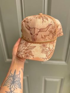 This hat fits *MOST* headsizes and has an adjustable back strap.  Each hat is hand burned and can vary slightly. Burned Baseball Hat, Ways To Style Sweatpants, Skull Sunflower, Burned Hats, Hat Burning, Hat Bar, Country Hats, Longhorn Cow, Hand Burn