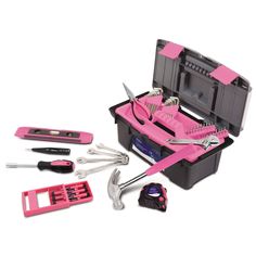 a pink tool box filled with tools on top of a white table next to other items