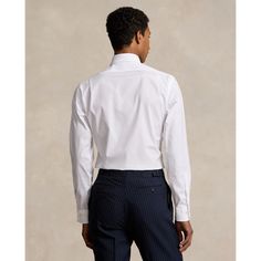 This polished shirt is crafted with 120s-quality two-ply cotton poplin and features our signature embroidered Pony. Formal White Poplin Tops, White Poplin Tops For Formal Occasions, Ralph Lauren Long Sleeve Business Tops, Tailored Cotton Dress Shirt With Spread Collar, Fitted Ralph Lauren Tops For Business Casual, Formal Poplin Tops With Spread Collar, Fitted Poplin Shirt For Office, Fitted White Poplin Top, Ralph Lauren Fitted Formal Tops