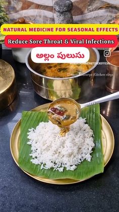 a plate with rice and sauce on it next to other bowls filled with food,