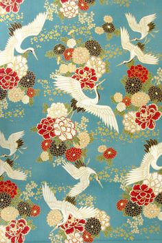 a blue background with birds and flowers on it