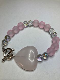 Pink Quartz Heart Glass Beads Measure the circumference of your wrist and add 1/2 inch to get the correct size. Please message me at the checkout, if you would like the item with a gift box (Complimentary) To return to my homepage, click the below: https://www.etsy.com/shop/AllisonsJewels Yellow Flower Necklace, Awesome Crafts, Clear Beads, Heart Stone, Diy Bracelet Designs, Beads Bracelet Design, Classy Wedding, Pink Beads, Stone Heart