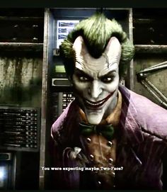 the joker is standing in front of a microwave