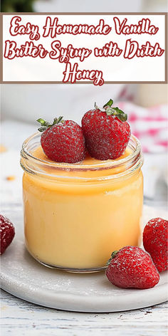 some strawberries are sitting in a jar on a plate with the words easy homemade vanilla butter syrup with data honey