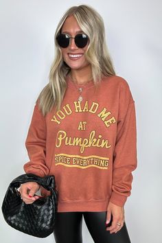 Details: Indulge in cozy comfort with our Pumpkin Spice Everything Graphic Pullover. Made from garment-dyed fabric, this long sleeve sweatshirt boasts an oversized fit and features the playful phrase "You Had Me At Pumpkin Spice Everything". Perfect for any fall enthusiast, you won't be able to resist snuggling up in this top. (Pumpkin spice latte not included.) - "You Had Me at Pumpkin Spice Everything" graphic - Long sleeves Content: 50% COTTON 50% POLYESTER Size + Fit Model is 5'4" and wearin Trendy Soft-washed Hoodie For Fall, Trendy Soft-washed Fall Hoodie, Fall Long Sleeve Soft-washed Sweater, Letter Print Sweats For Fall Streetwear, Letter Print Sweats For Streetwear In Fall, Cozy Fit Graphic Sweatshirt For Fall, Cozy Fit Graphic Print Sweatshirt For Fall, Graphic Print Cozy Fit Sweatshirt For Fall, Cotton Sweatshirt With Text Print For Fall