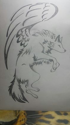 a drawing of a wolf with wings on it's back and the other side