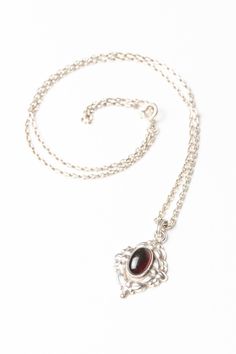 A beautiful sterling silver vintage Norwegian necklace with an oval red stone probably agate, looks stunning under the light. It would be a wonderful gift for someone special. Hallmarked: 830S for Norway, Sterling Silver. Hallmarked 830 S NMF Weight: 6.2 grams Pendant Length: 2.5cm Pendant Width: 1.5cm Chain Length: 22cm Vintage Oval Necklace With Polished Finish, Vintage Oval Necklaces With Polished Finish, Victorian Oval Link Necklaces As Gifts, Ornate Oval Pendant Necklaces For Formal Occasions, Ornate Oval Pendant Necklace For Formal Events, Silver Oval Cabochon Necklace For Formal Occasions, Gift Oval Cabochon Necklace With Polished Finish, Vintage Hallmarked Oval Cabochon Necklace, Classic Hallmarked Oval Cabochon Necklace