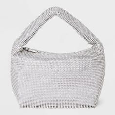 Add shine and glamor to your looks with the Crystal Mesh Handbag from A New Day™. This silver handbag features a mesh design accented with crystals to elevate the look. It is designed with a main compartment and a zippered inner pocket to help keep your cellphone and cards separate. Boasting a lightweight construction, this handbag allows convenient carrying with the single strap. A New Day™: Style that goes wherever you do. Holiday Party Looks, Crystal Handbag, Target Christmas, Styled Outfits, Silver Handbag, Glam Gifts, Mini Bows, Outfit Shop, New Year Party