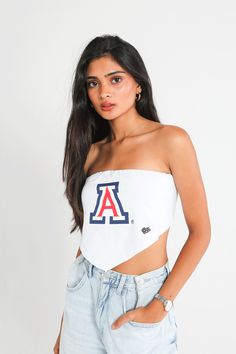 Our Bandana Top is the perfect trendy piece to complete your game day fit! Features a strapless, cropped silhouette with a ruched, elastic back and pointed bottom hem. SIZING AND DETAILS Sizing: XS-XXL Adjustable back ties 95% Cotton, 5% Spandex Heat Transfer Vinyl logo application P.S. We’d love to see you repping this style! Make sure to tag us (@hypeandvice) to be featured :) Vinyl Logo, Logo Application, Bandana Top, Transfer Vinyl, Heat Transfer Vinyl, Game Day, Heat Transfer, See You, Arizona