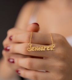 "Our 14K Gold name necklaces do not turn yellow and have a colorfast structure. In this way, you can use your name necklace for many years. The 14K Gold Name Necklace is an essential accessory for a woman or a girl. ❤️ It would be an amazing gift for Valentines Day, Anniversary, Birthdays, Christmas, Mother's Day, Women's Day. ❤️Gold Name Necklace is sent with a special packaging. I have prepared a special wooden box for you. You can share it with your loved ones as a personalized gift. ❤️You can ask us for help when ordering your Nameplated necklace. We can send you a design of the necklaces with fonts beforehand. FEATURES - Material: 14K Gold, Rose Gold, White Gold - Letter height is 8.5mm to 9mm. (1/3 inches) - Color Options: Gold, Rose, White ❤️Production Techniques: Handmade and Laser Customized Yellow Gold Necklace For Anniversary, Yellow Gold Name Necklace With Round Pendant, Customizable Nameplate Jewelry For Formal Occasions, Customized Gold Necklace For Anniversary, Customized Nameplate Necklaces For Anniversary, Yellow Gold Round Pendant Necklace With Name, Customized Yellow Gold Nameplate Jewelry, Name Pendant Necklaces For Anniversary, Name Pendant Necklace For Anniversary