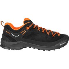 Tackle technical approaches and rocky, run-down trails with the Wildfire Leather Hiking Shoe. Designed with top climbers and mountain guides, this shoe quickly transitions from being a climbing-focused shoe to a quality hiking companion. With a roomy toe box, mesh lining for breathability, and an EVA midsole, this is the shoe to offer comfort and protection throughout our adventure. Black Lace-up Climbing Sneakers, Low-top Gore-tex Walking Shoes With Laces, Waterproof Lace-up Walking Shoes For Climbing, Waterproof Low-top Trail Running Shoes For Climbing, Black Waterproof Sneakers For Climbing, Gore-tex Trail Running Shoes With Rubber Sole, Gore-tex Trail Running Shoes With Rubber Sole And Lace-up, Gore-tex Hiking Running Shoes, Gore-tex Walking Shoes With Laces For Sports