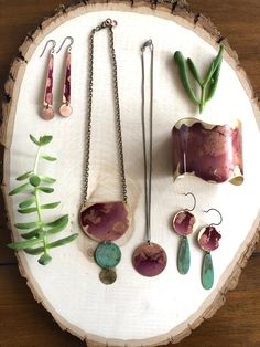 "Oxidized brass metal with shades of pink and green verdigris. Hang from oxidized sterling silver ear wires. Measure ~ 1\"x2.5\" **shades of color will vary due to the patina process. The product pictured is a sample of what you will receive.** Handmade in the USA ssd jewelry ©️ 2018" Earthy Nickel-free Copper Jewelry, Nickel-free Earthy Bronze Jewelry, Earthy Bronze Nickel-free Jewelry, Nickel-free Copper Artsy Jewelry, Artsy Nickel-free Copper Jewelry, Artisan Nickel-free Copper Jewelry, Handmade Fusion Copper Jewelry, Nickel-free Artisan Copper Jewelry, Handmade Copper Fusion Jewelry