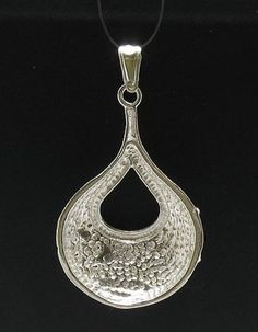 Sterling silver pendant - PE000433. APPROXIMATE WEIGHT 5.2 GRAMS. DIMENSIONS 4.0X2.9CM. (1.6X1.16 INCHES) All our jewels are made from solid sterling silver 925/1000 and are carefully crafted by hand in our family workshop.We dispatch your orders in 5 working days, worldwide and the postage is $5. We ship registered priority mail. Please allow 5-7 working days for delivery in Europe and 10-15 working days outside Europe.For any questions – please do not hesitate to contact me! Silver Hallmarked Teardrop Pendant Jewelry, Silver Hammered Oval Pendant Jewelry, Silver Hammered Pendant Jewelry, Silver Diamond Cut Teardrop Jewelry, Silver Teardrop Jewelry With Diamond Cut, Silver Teardrop Pendant With Polished Finish, Silver Teardrop Pendant Jewelry With Polished Finish, Silver Polished Teardrop Pendant Jewelry, Silver Hammered Teardrop Pendant Jewelry