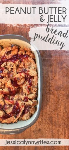 a pie in a pan sitting on top of a wooden table next to a sign that says peanut butter and jelly bread pudding