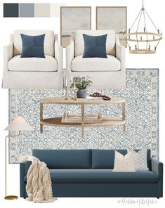 blue and white living room with couches, coffee table, lamps and pictures on the wall