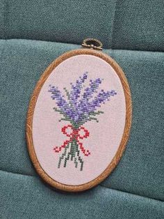 Cross stitch pattern from Cute Embroidery By Kate featuring a beautiful bouquet of lavender flowers!


Pattern stitched on 14 Ct. Aida in the color of your choice using DMC floss. Stitch Count: 36 x 52. Finished size: 2.57" x 3.71". Circular Cross Stitch Patterns, February Cross Stitch Patterns, Cross Stitch Designs Simple, Dandelion Cross Stitch Pattern, Small Flower Cross Stitch Pattern, Small Cat Cross Stitch Pattern, Simple Cross Stitch Patterns Free Charts, Cottage Core Cross Stitch, Finished Cross Stitch Ideas