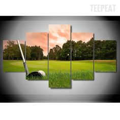 a golf course with green grass and trees in the background, on a cloudy day