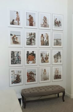 a white wall with pictures on it and a bench in front of the photo collage