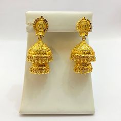 "Handmade Jhumka Earrings 22ct Micro Gold Plated Earrings Indian jewelry Pakistan Jewelry  Length:2.8\"Inches Approx  Traditional Indian Wedding Jewellery Slight Colour variations possible due to difference in screen and photograph  It is a perfect match with formal attire on special occasions or with casual wearing Care instructions Keep Jewellery away from direct heat, water, perfumes, deodorants and other strong chemicals as they may react with the metal or plating. The plating composition of Jewellery is as such that  perspiration (sweat) will not damage it. Wipe Jewellery gently with chamois cloth or leather swatch after every use. Wiping the jewellery with a soft cloth after removing the jewellery would add to its life. Avoid water  exposure for all jewelry  Thank You For Visiting" Heavy 22k Gold Earrings For Puja, Yellow Gold Jhumkas For Puja, Yellow Gold Tilla Jhumkas For Puja, Gold Plated Jhumkas For Puja, 22k Gold Bollywood Earrings For Puja, Traditional Gold Plated Jhumkas For Puja, Gold Bollywood Jhumkas For Puja, Bollywood Style Yellow Gold Jhumkas For Puja, Gold Jhumkas For Puja And Eid