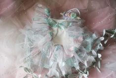 This is a listing for a romper/dress decorated with tulle ruffles with pearls and dragonfly applique. It comes with matching headband. You can order ONLY dress, ONLY headband or 2 pieces set. Sizes: The size is pretty flexible, it ties on the waist back area and it has an elastic.              9-18 month            Ready to ship! All used materials are new. All items are made with care in a smoke/pet free environment. I would like to invite you to Your Dream Pix LLC VIP customers group!  Please, join us for all news and updates from my shop, new products, SALES and discounts.  https://www.facebook.com/groups/550907811777869/ Thank you! White Fitted Fairy Dress For Dress-up, Sleeveless Fairy Dress With Ruffles For Wedding, Summer Fairy Dress With Ruffles For Dress-up, Sleeveless Ruffled Tutu Dress For Baptism, White Princess Fairy Dress With Ruffles, Summer Wedding Princess Dress With Ruffles, Summer Princess Dress With Ruffles For First Birthday, White Ruffled Fairy Dress For Summer, Whimsical White Sleeveless Princess Dress