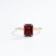 Emerald Cut Garnet Engagement Ring in Solid Gold - Red Garnet January Birthstone, Anniversary Gift Ring for Her This elegant emerald cut garnet engagement ring features a stunning red garnet set in solid gold. As the January birthstone, it makes a perfect anniversary or special occasion gift for her, blending classic beauty with a personal touch. Same design can be made also with other custom gemstones per request.  Product details: Stone - Natural Garnet Size - 6x8 Color - Red Metal - Solid Gol Classic Red Sapphire Promise Ring, Formal Garnet Birthstone Ring In Fine Jewelry Style, Elegant Garnet Diamond Ring, Formal Garnet Birthstone Ring Fine Jewelry, Elegant Red Garnet Diamond Ring, Formal Garnet Birthstone Ring, Red Baguette Cut Lab-created Ruby Ring, Ruby Ring With Rectangular Stone For Anniversary, Fine Jewelry Garnet Ruby Ring With Bezel Setting