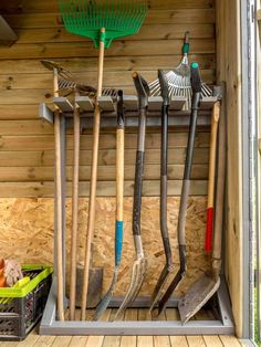 there are many gardening tools in the storage area