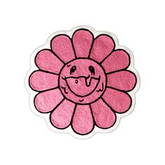 a pink flower with a smiley face on it's center and the words happy written in