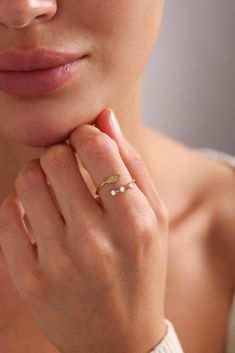 D I A M O N D ∙ ⚘ ∙ L E A F ∙ ⚘ ∙ R I N G Enhance your style with our exquisite Diamond Leaf Ring. This elegant and unique ring features a natural design with a delicate leaf adorned with three sparkling diamonds, adding a touch of nature-inspired beauty to any look. Perfectly balanced for both everyday wear and special occasions, it brings a subtle yet captivating charm to your ensemble. The distinctive design with a leaf and diamonds makes it a versatile accessory for any setting, from sporty White Open Ring With Initial For Anniversary, White Open Initial Ring For Anniversary, White Initial Open Ring For Anniversary, White Open Ring With Simple Design, White 14k Gold Open Ring Midi Rings, White 14k Gold Open Midi Rings, White Simple Open Ring, Tiny White Rings For Anniversary, Delicate White Stackable Rings For Gift