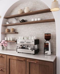 a coffee machine sitting on top of a counter