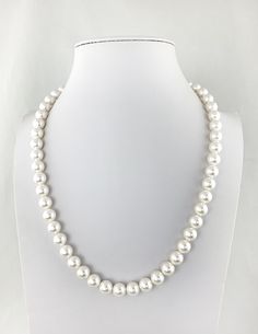 "Timeless elegance with a sleek modern twist! This strand of Mother of Pearls have a singular way of making virtually any ensemble seem just that little bit classier...a little more sophisticated. But, hang one...you don't want too much of that either. So how do you get the benefits of pearls while keeping the edginess of your carefully crafted contemporary aesthetic intact....by picking the right size, shape and color Alternative to real pearls at a quarter of the price, with the same classic e Elegant Adjustable Sterling Silver Beaded Necklaces, Elegant Sterling Silver Beaded Necklace, Classic Single Strand Jewelry For Everyday, Classic Pearl Necklaces With Polished Beads, Classic Beaded Necklaces With Round Beads, Classic Beaded Necklaces With Round Beads For Everyday, Classic Everyday Necklaces With Round Beads, Elegant White Round Beaded Necklaces, Classic Single Strand Beaded Necklaces