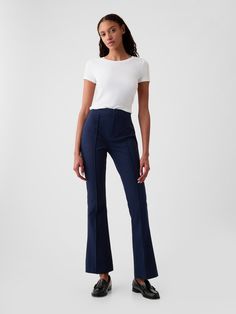 Soft cotton-spandex stretchy dress pants.  Snap button closure, zip fly.  Pintuck pleat at front.  Back welt pockets.  Our High Rise Jean has an 11" 28 cm) rise. ​ Slim through the hip and thigh, flares from knee to leg opening.  Model is approx.  5’10” wearing Stretchy Dress Pants, Buisness Casual, Work Pants Women, Navy Blue Pants, Stretchy Pants, Stretchy Dress, Gap Pants, Black Dress Pants, Professional Outfits