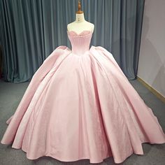 Pink Strapless Satin Quinceanera Dress Princess Style Quinceanera Dress For Prom, Sweetheart Neckline Ball Gown For Sweet 16 And Prom, Sweetheart Neckline Quinceanera Dress For Prom Season, Sweetheart Neckline Ball Gown With Corset Back, Sweetheart Neckline Ball Gown For Quinceanera And Prom, Ball Gown With Corset Back And Sweetheart Neckline, Elegant Gown With Boned Bodice For Quinceanera, Strapless Ball Gown With Boned Bodice For Debutante Ball, Quinceanera Ball Gown Evening Dress With Corset Back