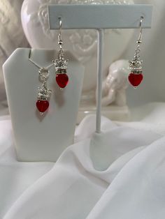 "\"Lovely Little Prince\" Necklace and Dangle Earring set made with Translucent Red Pressed Czech Glass and Silver Mini Crowns is a sweet and cherished little fairy tale of a love note." Red Jewelry Set For Anniversary, Red Jewelry Set With Matching Earrings For Anniversary, Nickel-free Red Jewelry For Mother's Day, Red Jewelry With Matching Earrings For Mother's Day, Personalized Red Dangle Jewelry, Red Sterling Silver Party Jewelry Sets, Red Sterling Silver Jewelry Sets For Party, Red Nickel-free Jewelry For Valentine's Day, Nickel-free Red Jewelry For Valentine's Day