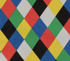 an image of multicolored squares on white fabric