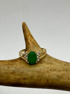 vintage green fun jade ring  Setting is a golden finished bronze setting  This is one of my hand re finished treasures. Salvaged from vintage.  Size   7.5 Re sizing can be done for a $20 fee and may take up to a week.  Engraving is $4 per letter.  Thank you for supporting a veteran's small business. All jewelry is shipped free within the US in a stylish gift box Formal Oval Emerald Ring With Gemstone Accents, Oval Emerald Ring With Gemstone Accents In Yellow Gold, Oval Emerald Ring In Yellow Gold With Gemstone Accents, Fine Jewelry Emerald Green Oval Cabochon Ring, Green Stone Jewelry For Anniversary, Green Stones Jewelry For Anniversary, Green Oval Cabochon Emerald Ring, Emerald Oval Cabochon Ring As A Gift, Classic Green Emerald Ring With Gemstone Accents